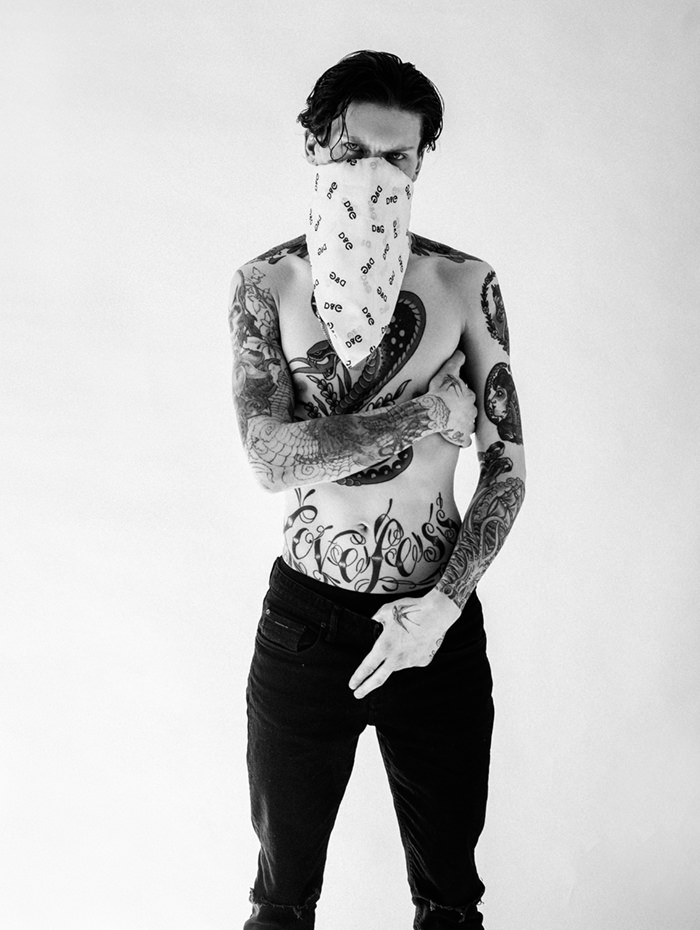 JOE is wearing Scarf- Dolce&Gabbana, Jeans - artists own