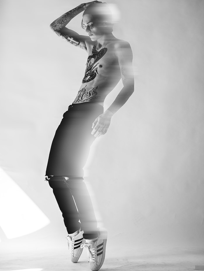 JOE is wearing Jeans - artists own, Shoes - adidas