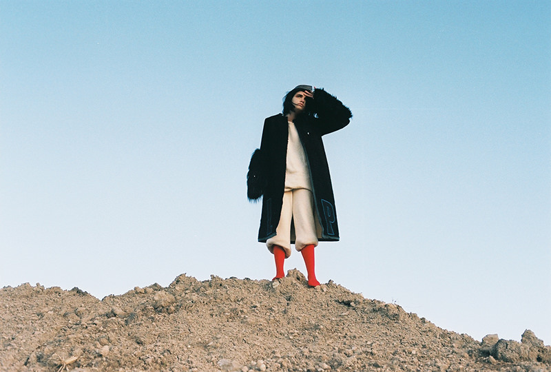 Coat: Eduardo De Crisci, Sweater&Pants: Bastardo ba, Crown: Cruda, Socks: stylist’s own