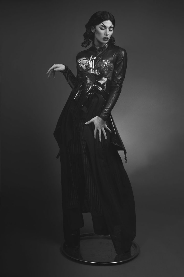 Metal corset by Kerta von Kubin, glossy jacket by Fiona Radszuhn,  double pinstripes trousers by Gabriele Papi