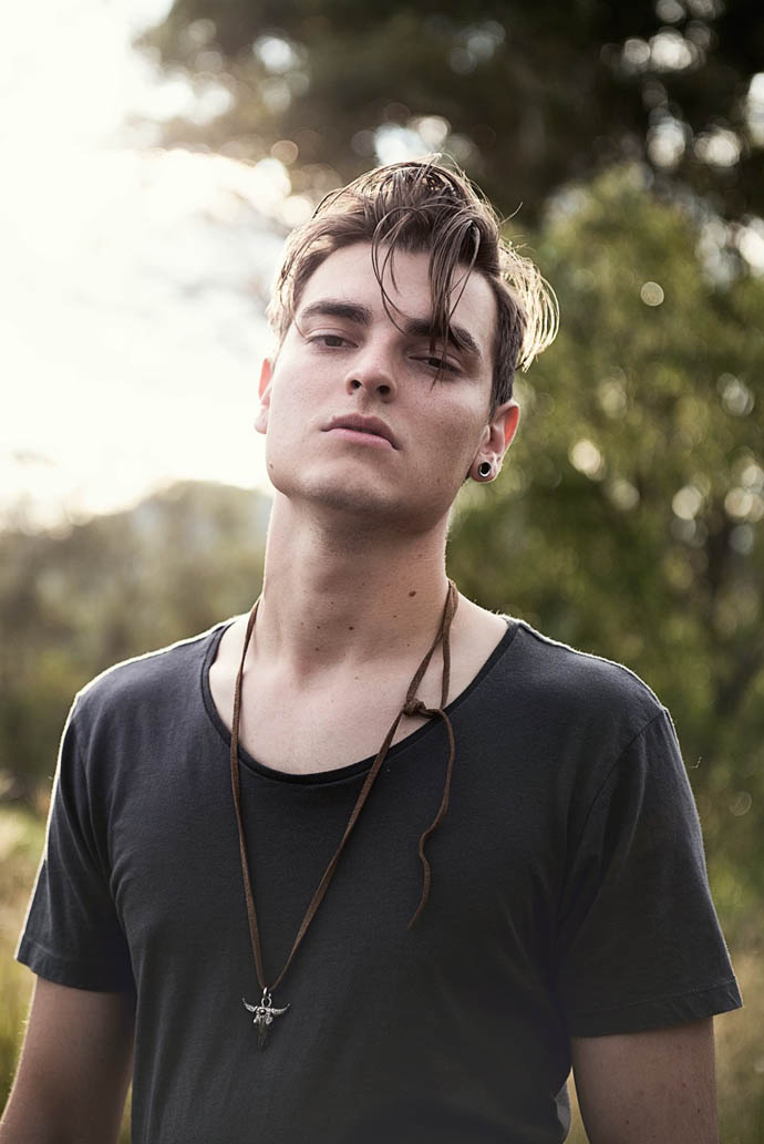 Sam is wearing - models own shirt, Necklace- SJ Dynasty