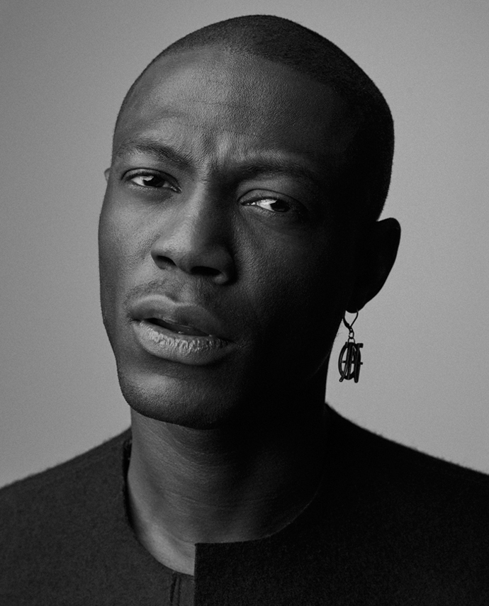 VEST: BLACK VELVET CIRCUS EARRING: JEAN PAUL GAULTIER VINTAGE