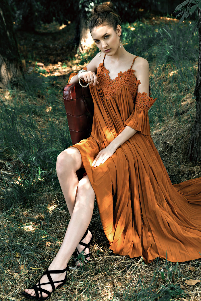 Dress by SELF-PORTRAIT Shoes by STUART WEITZMAN Earrings by VIVIENNE WESTWOOD Bracelets by CHANEL