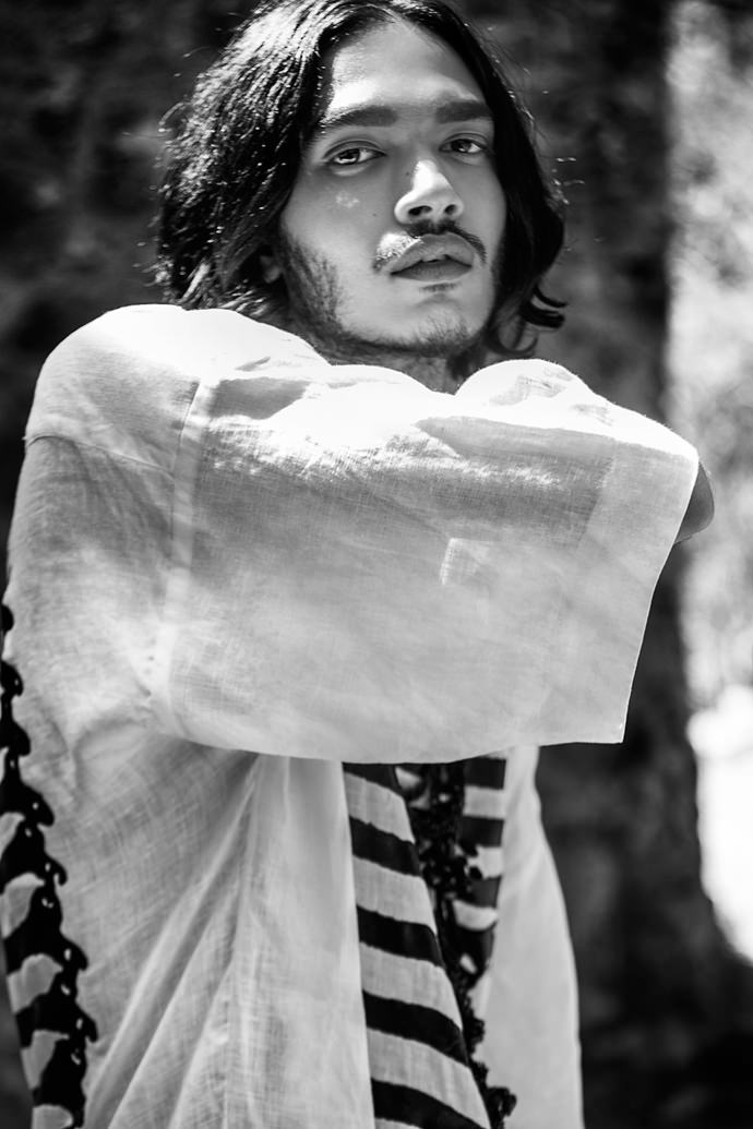 Rabanne wears shirt by Tom Rebl
Neckpiece by Tom Rebl