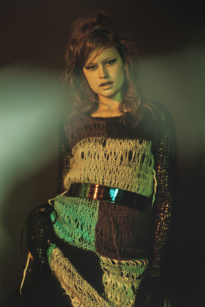 Junya Watanabe patchwork crocheted sweater dress, Dries Van Noten patent belt