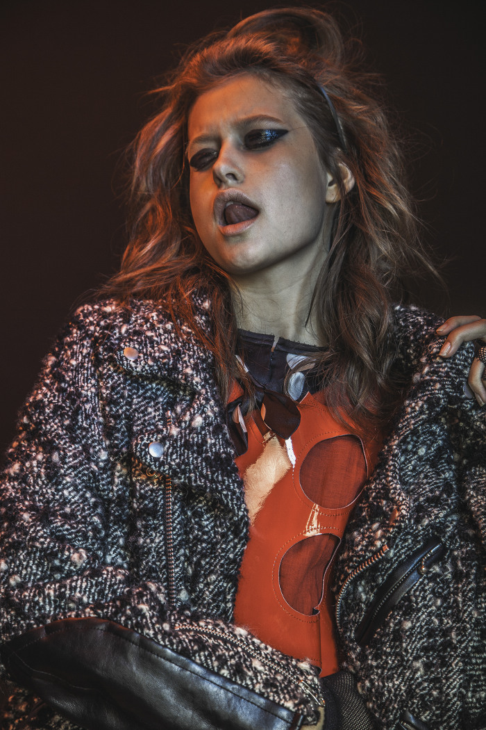 Junya Watanabe tweed and vinyl motorcycle jacket, CommeDesGarcons red vinyl dress w/cut outs and polka dot bow blouse