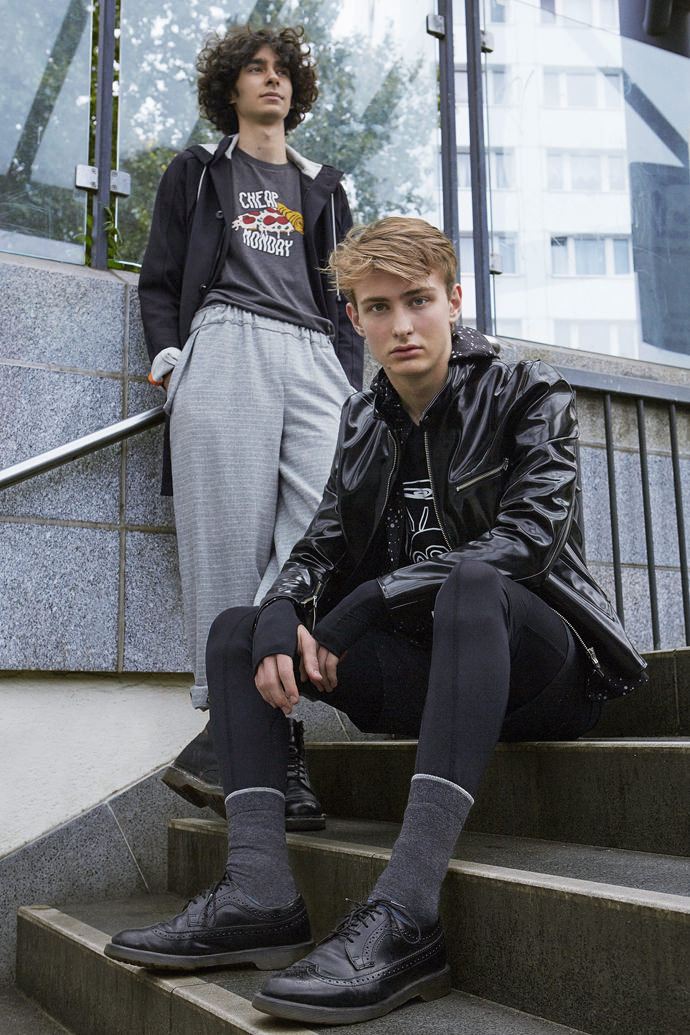 Parka by Brownie and Blondie Printed Tee-shirt by Cheap Monday Wide pant by Tim Labenda Shiny biker jacket by Stutterheim Tee-shirt by Henrik Vibskov Socks and Leggings by Brownie and Blondie