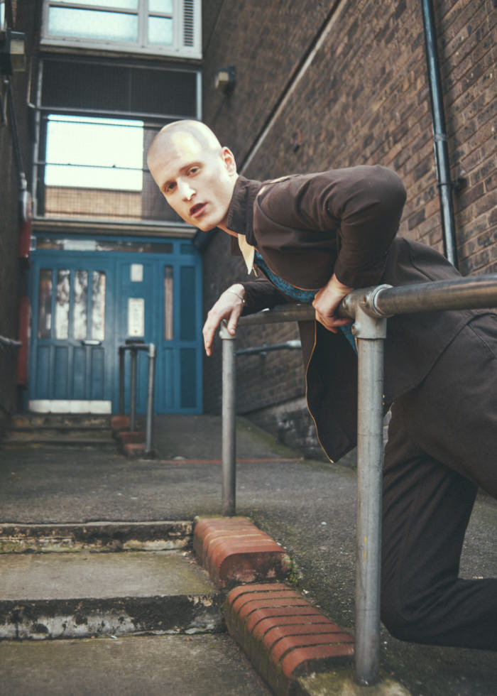 Jacket: Rascals DK Polo: Stüssy Trousers: Rascals DK Socks: Stylists Own Shoes: Garment Project