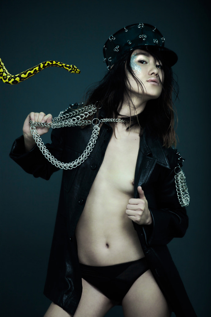 Cap X-ray with iron rings & Iron chainmail necklace by Romain Thevenin . Leather jacket with embroidered shoulders fishnet t-shirt by Vintage rtp