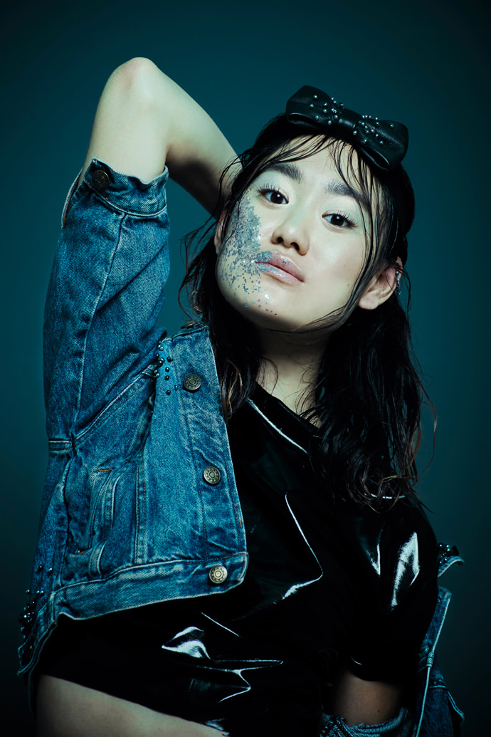 Leather bow tie with hematite beads & vynil crop top by Romain Thevenin Jeans jacket & trousers with embroideries VINTAGE RTP