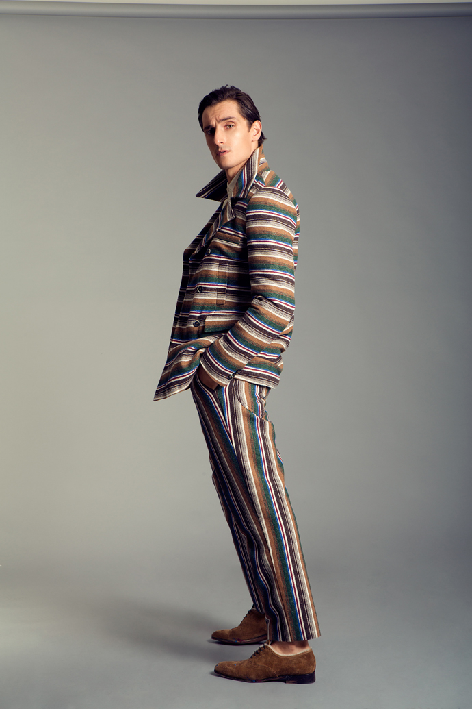 Jacket: Mitchumm Industries Shirt: Emiliano Rinaldi Trousers: Mitchumm Industries Shoes: Salvatore Ferragamo