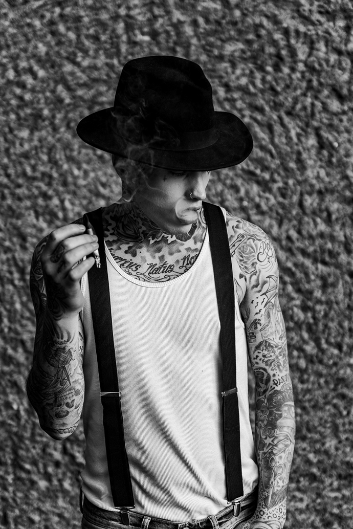 Hat Model’s own Braces Model’s own White vest Model’s own