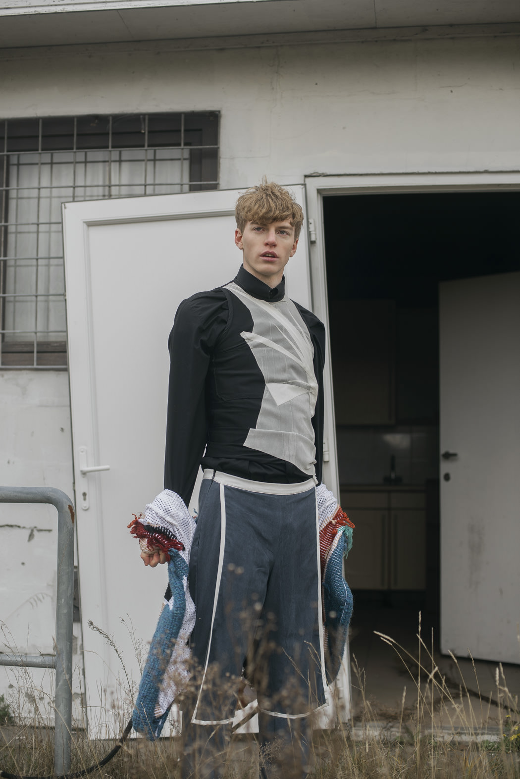 Black shirt by Vintage Top by Ari Kolu Sweater by Ari Kolu Trousers by Ari Kolu Shoes by Stan Smith by Adidas 